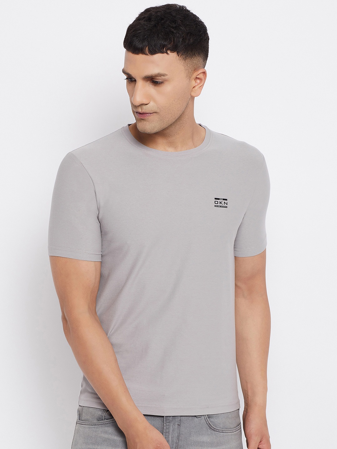 

Okane Men Grey Solid T-shirt