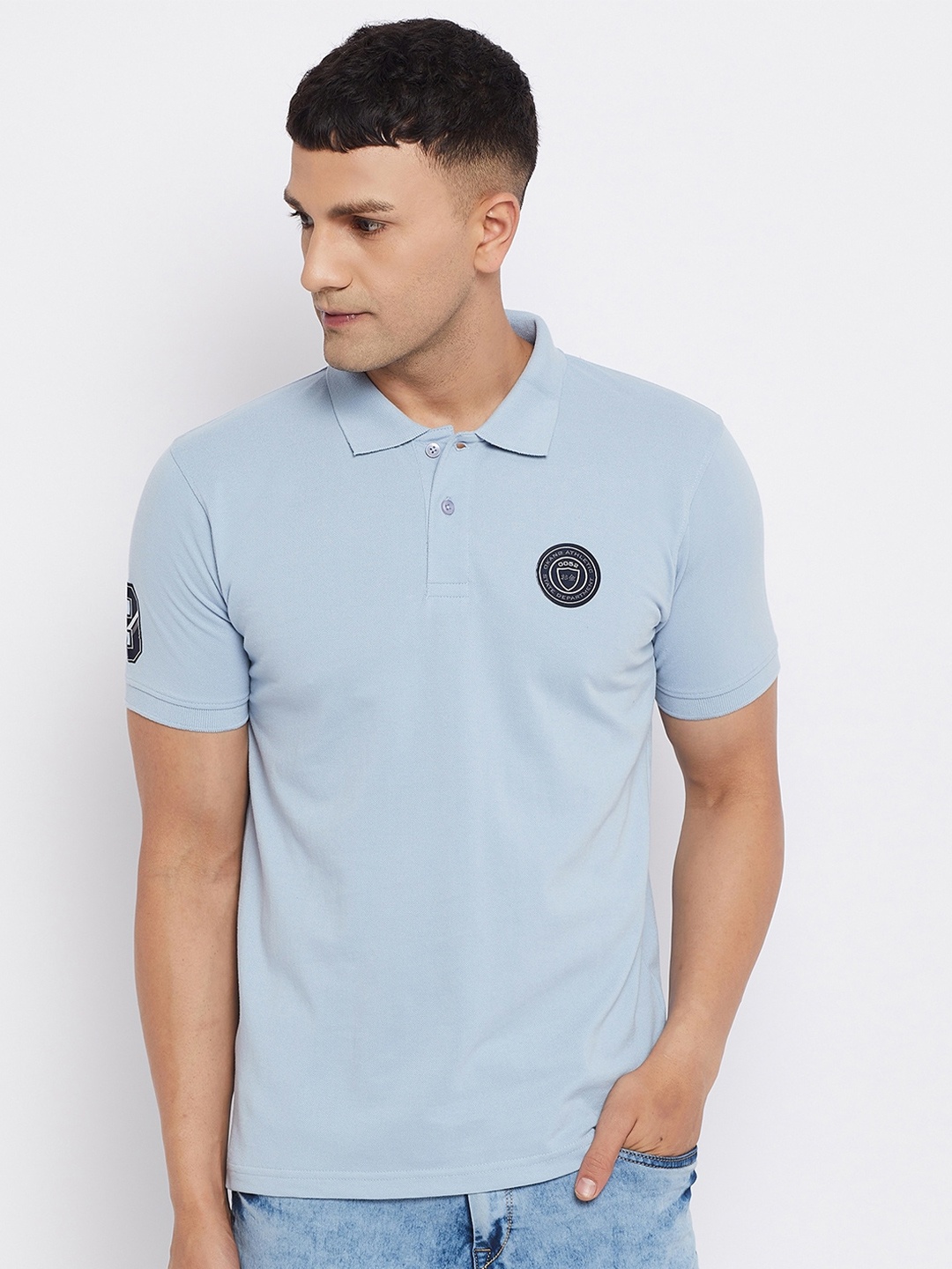 

Okane Men Blue Solid Polo Collar T-shirt