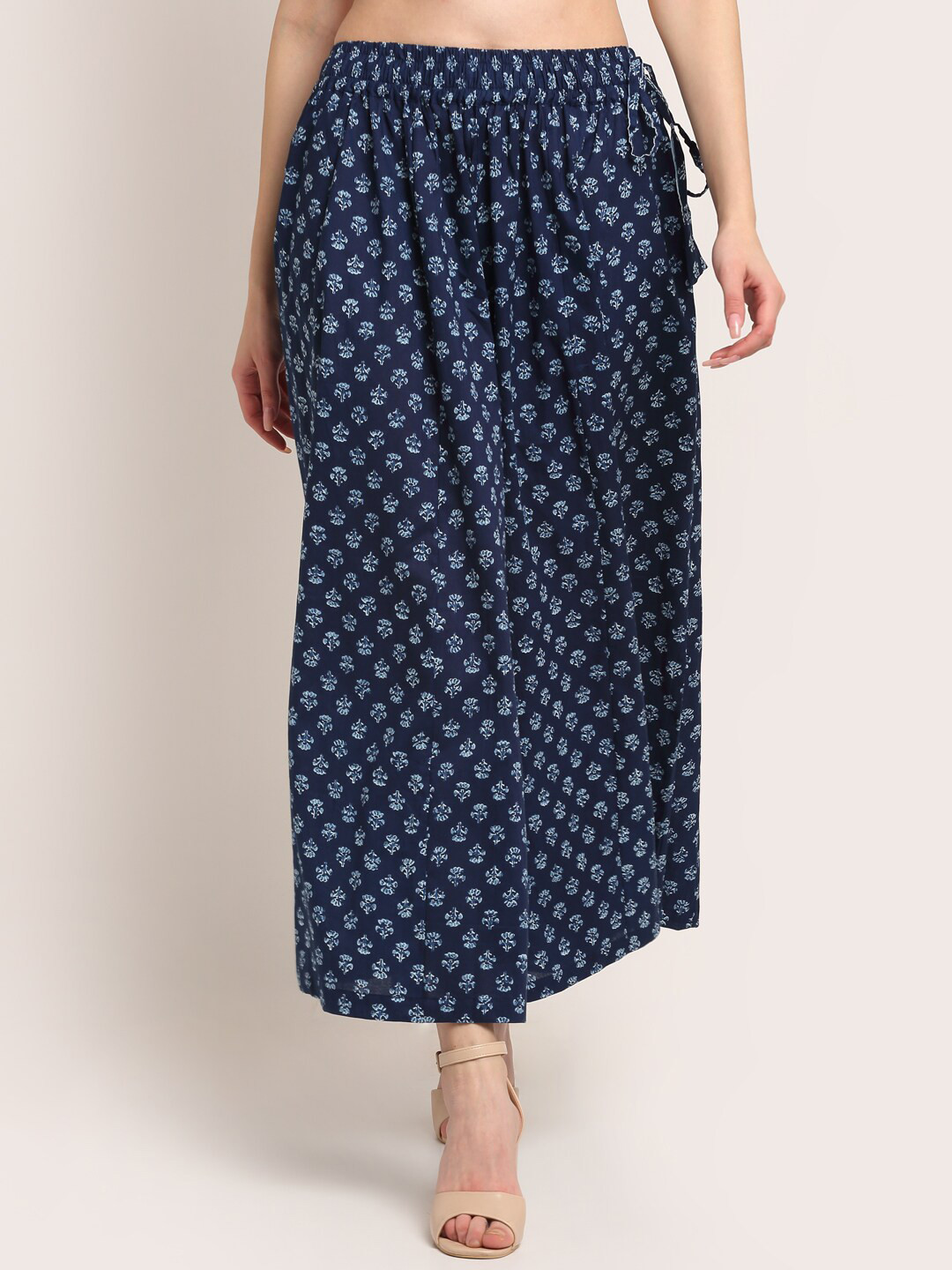 

TAG 7 Women Navy Blue & White Ethnic Motifs Printed Flared Ethnic Palazzos