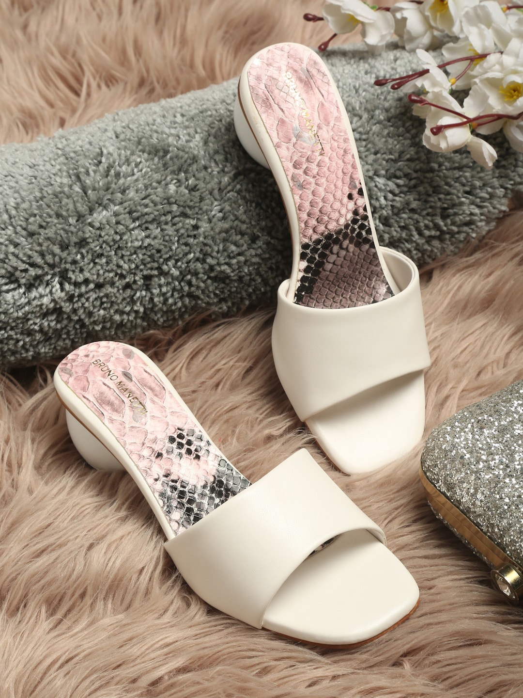 

Bruno Manetti Off-White Solid Block Heels