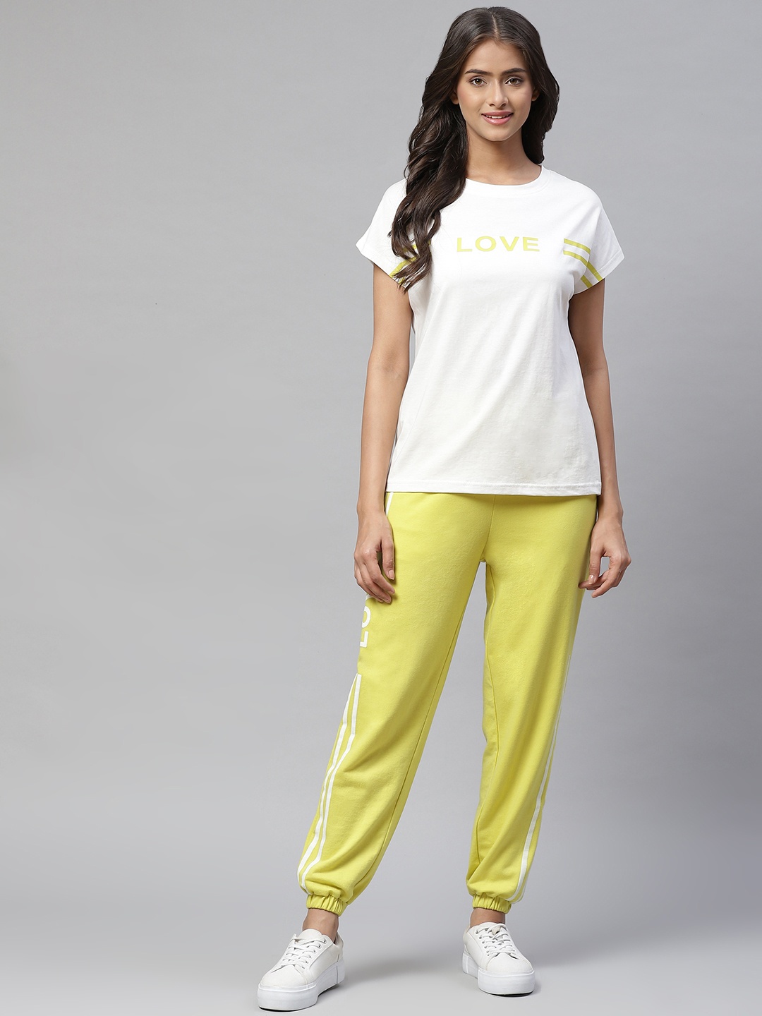 

Laabha Women White & Yellow Printed Tracksuit