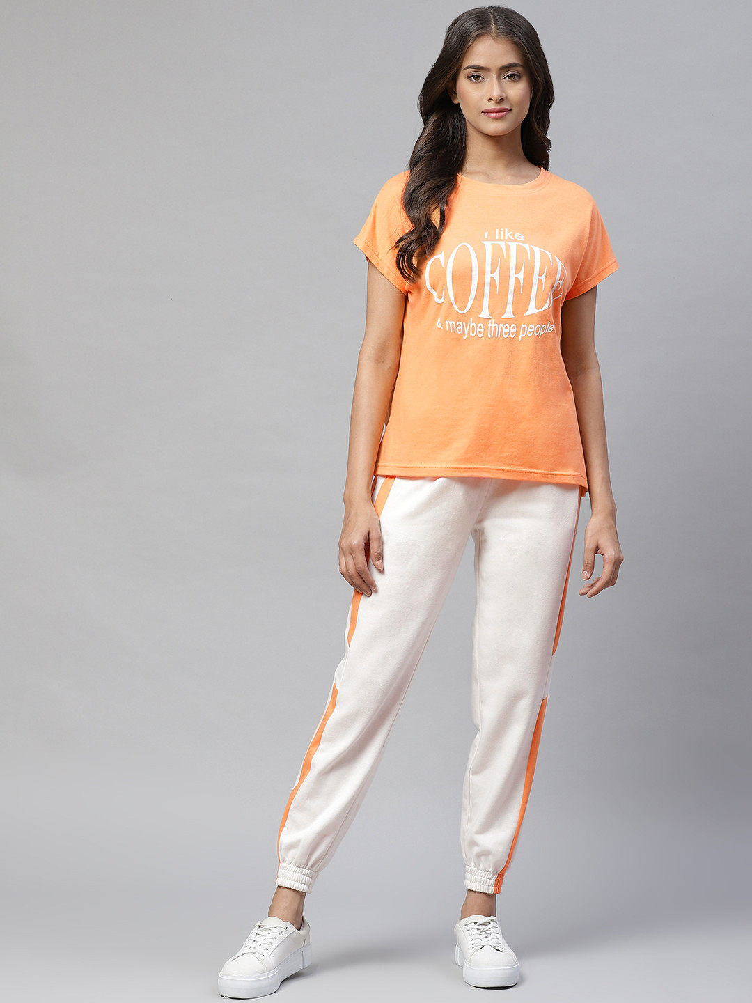 

Laabha Women Orange & White Printed Tracksuit