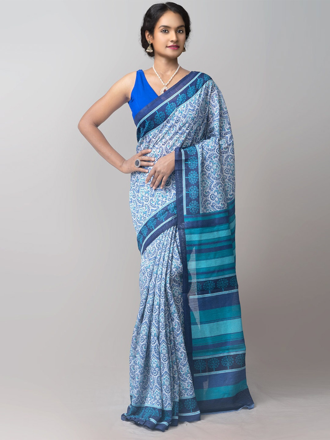 

Unnati Silks Blue & White Paisley Silk Cotton Patola Saree