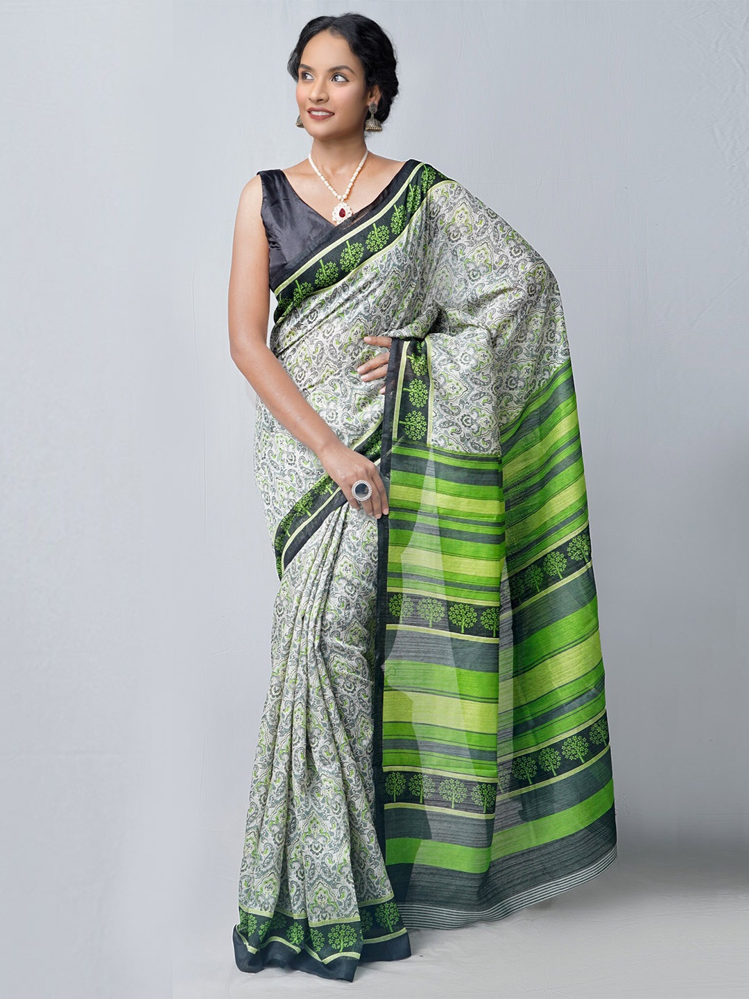 

Unnati Silks Green & Grey Ethnic Motifs Silk Cotton Patola Saree