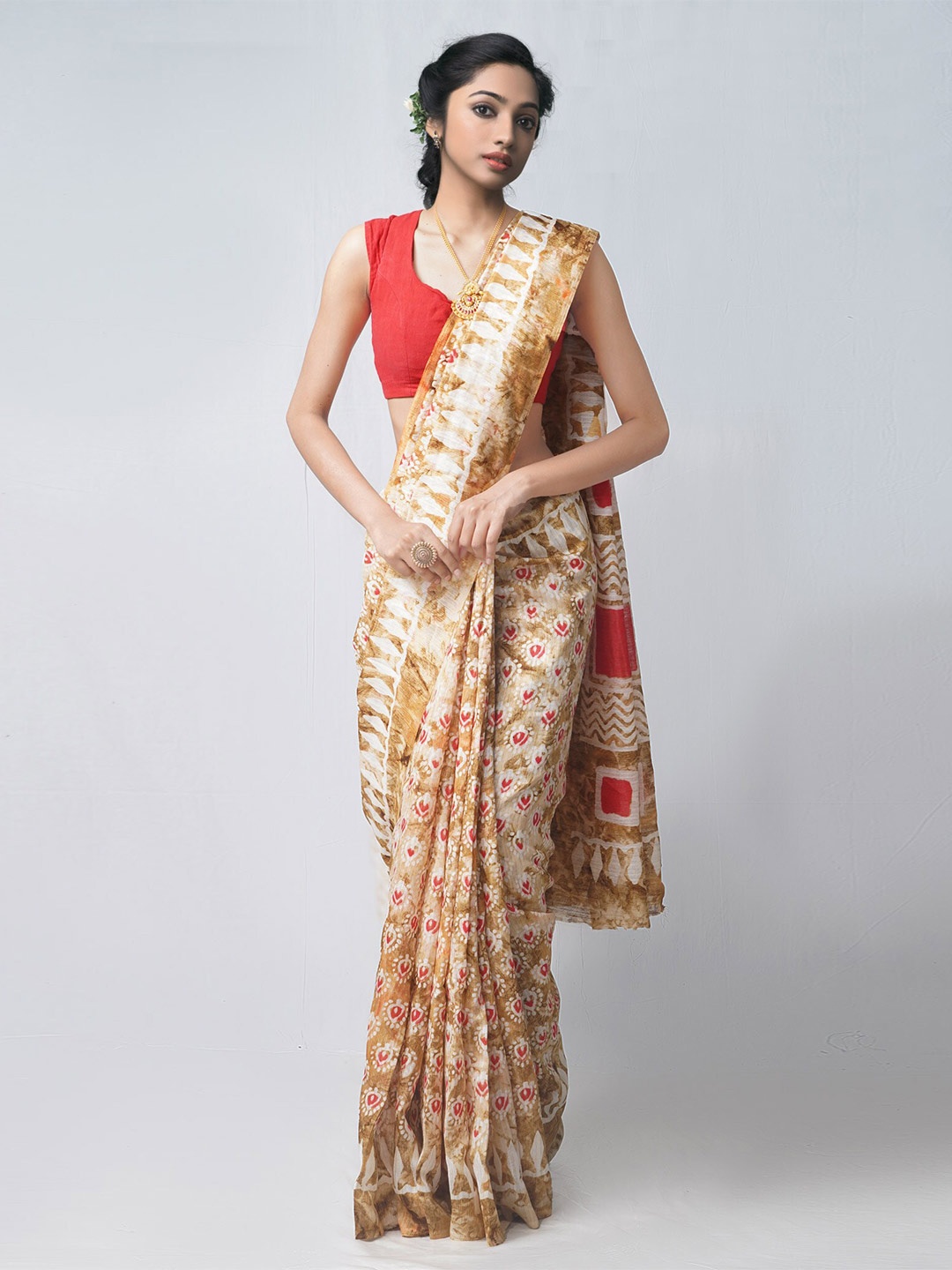 

Unnati Silks Beige & White Ethnic Motifs Printed Silk Cotton Patola Saree