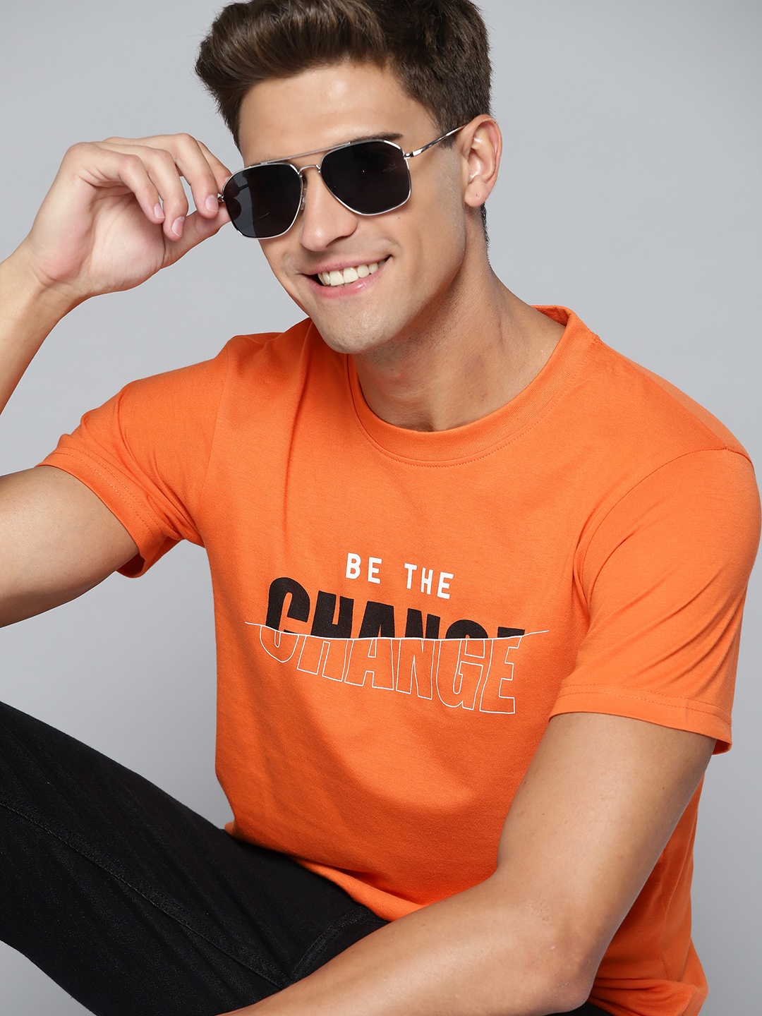 

HERE&NOW Men Orange & Black Typography Printed T-shirt