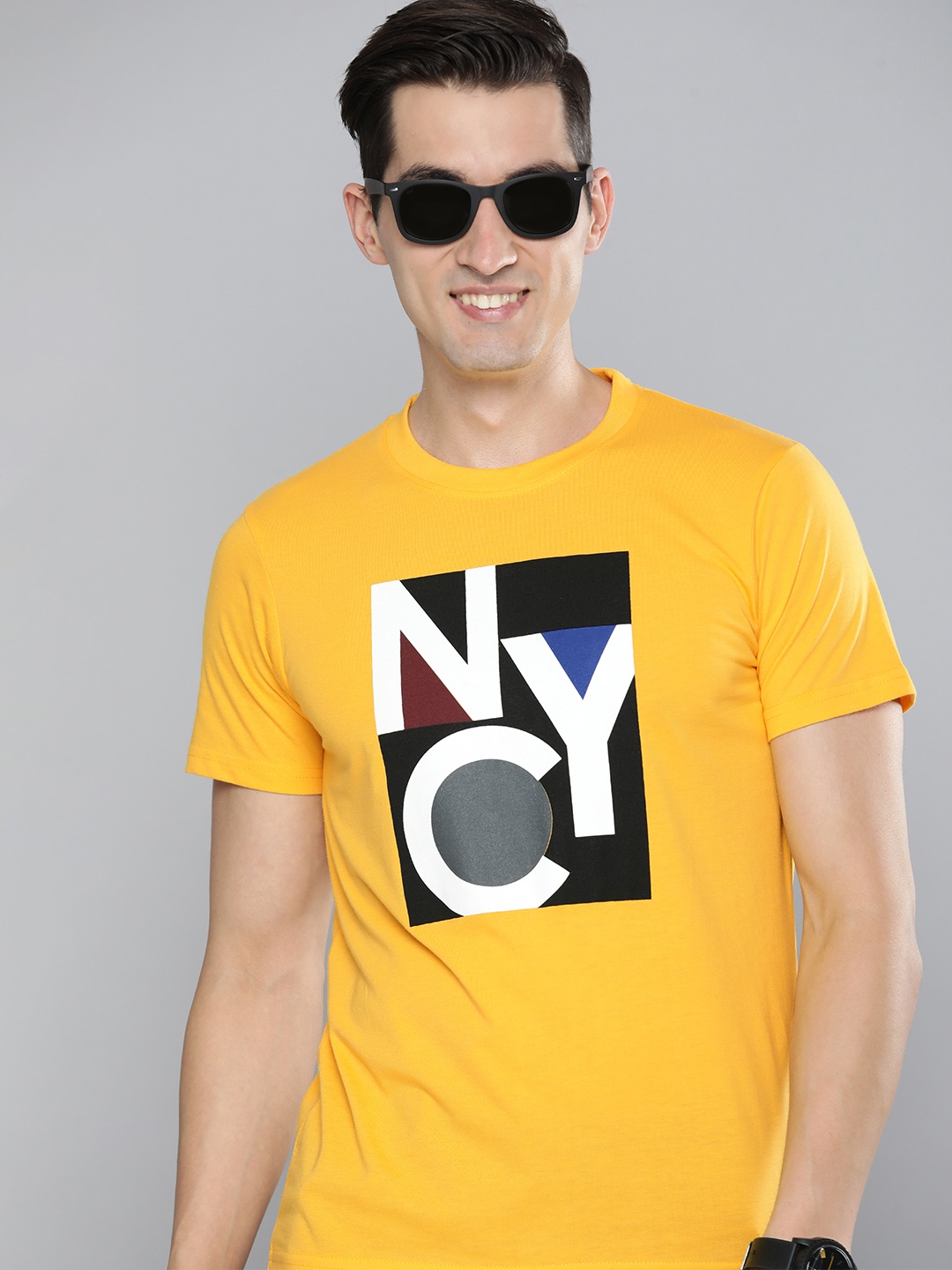 

HERE&NOW Men Yellow Typography Printed T-shirt