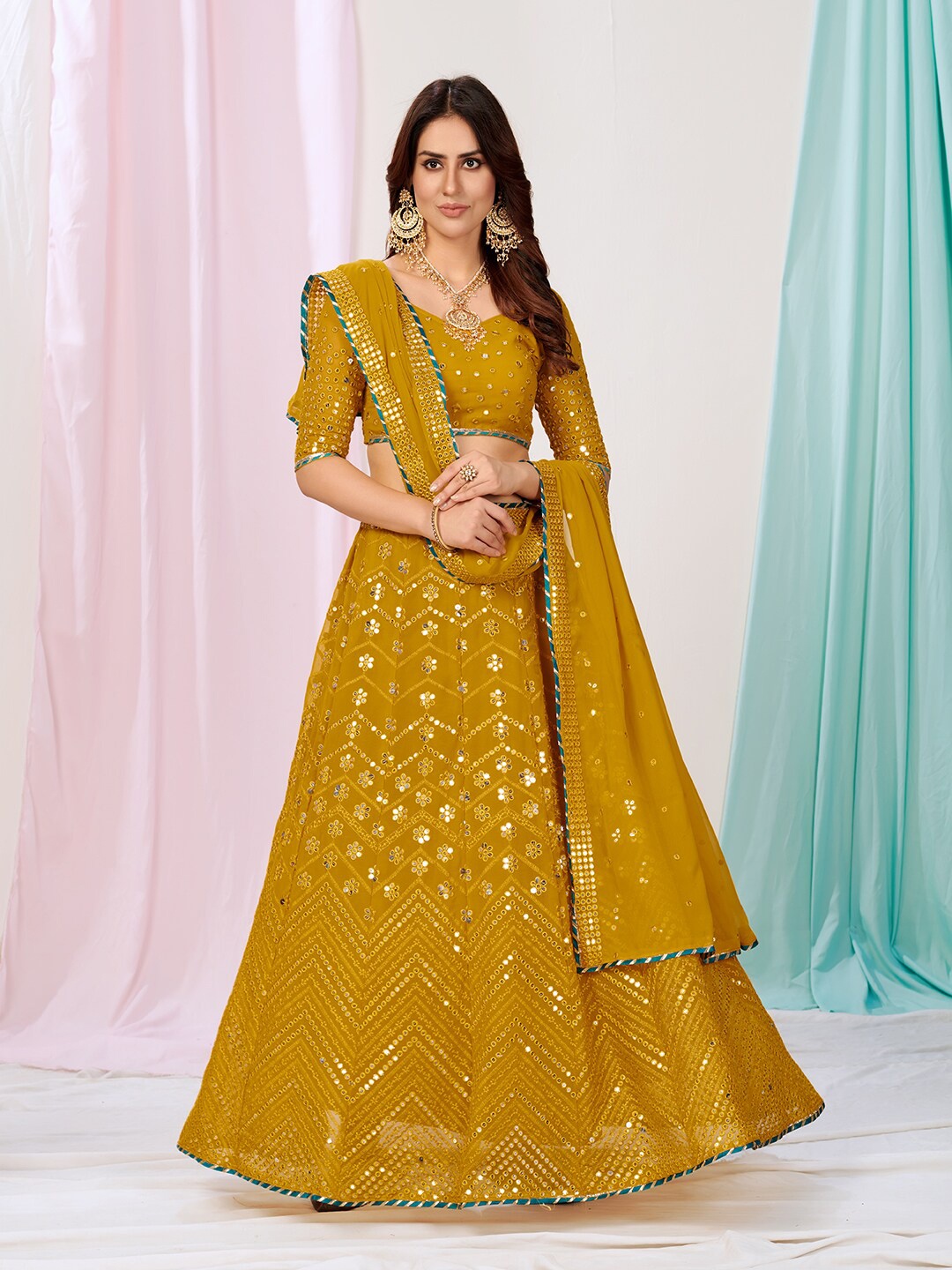 

WHITE FIRE Yellow Embellished Mirror Work Semi-Stitched Lehenga & Unstitched Blouse With Dupatta