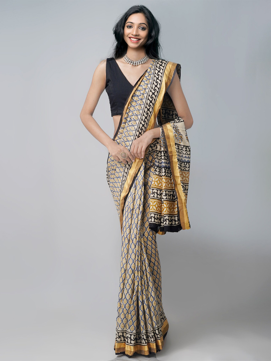 

Unnati Silks Blue & Beige Ethnic Motifs Zari Pure Cotton Bagru Saree