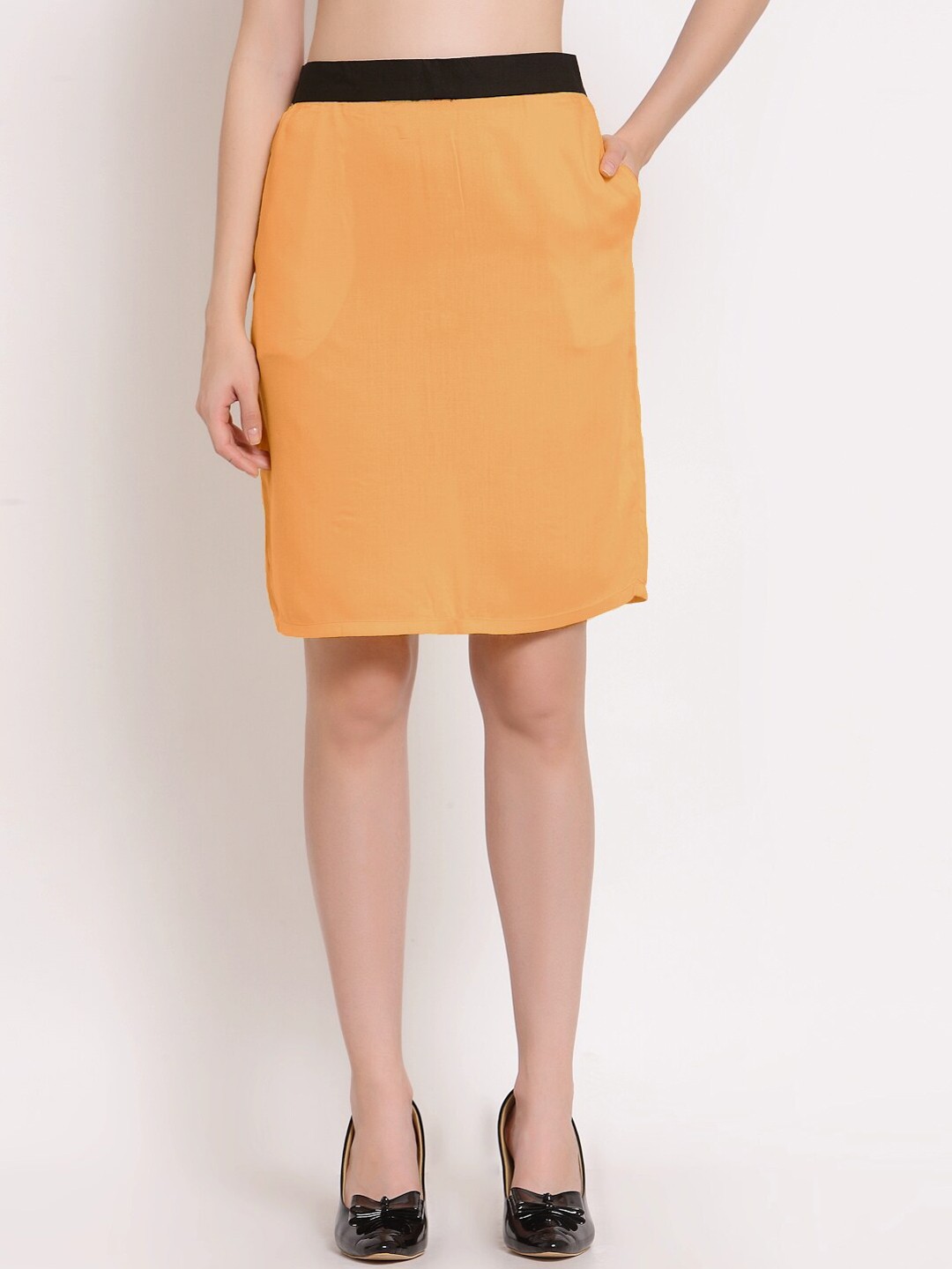 

PATRORNA Women Peach-Colored Solid Knee Length Pencil Skirt