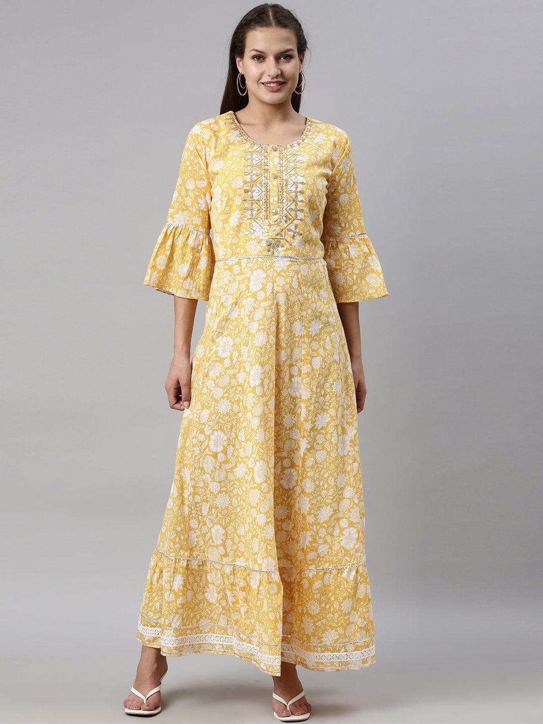 

Neerus Women Yellow Floral Printed Flared Sleeves Gotta Patti Work A-Line Kurta