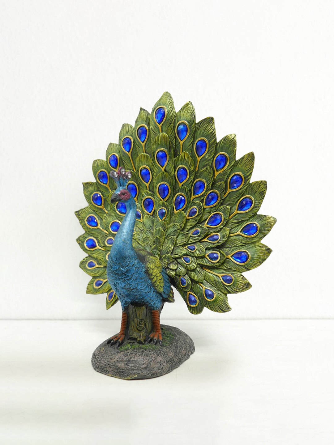 

Home Centre Green & Blue Corsica Stone Encrusted Peacock Figurine