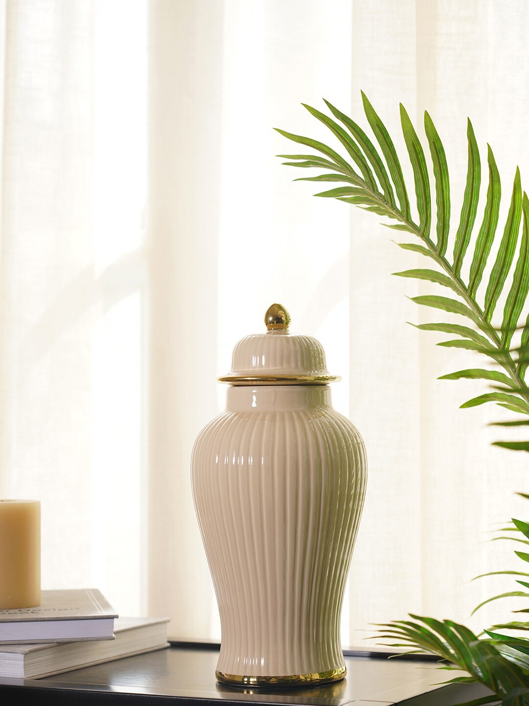 

Pure Home and Living Beige Solid Showpieces