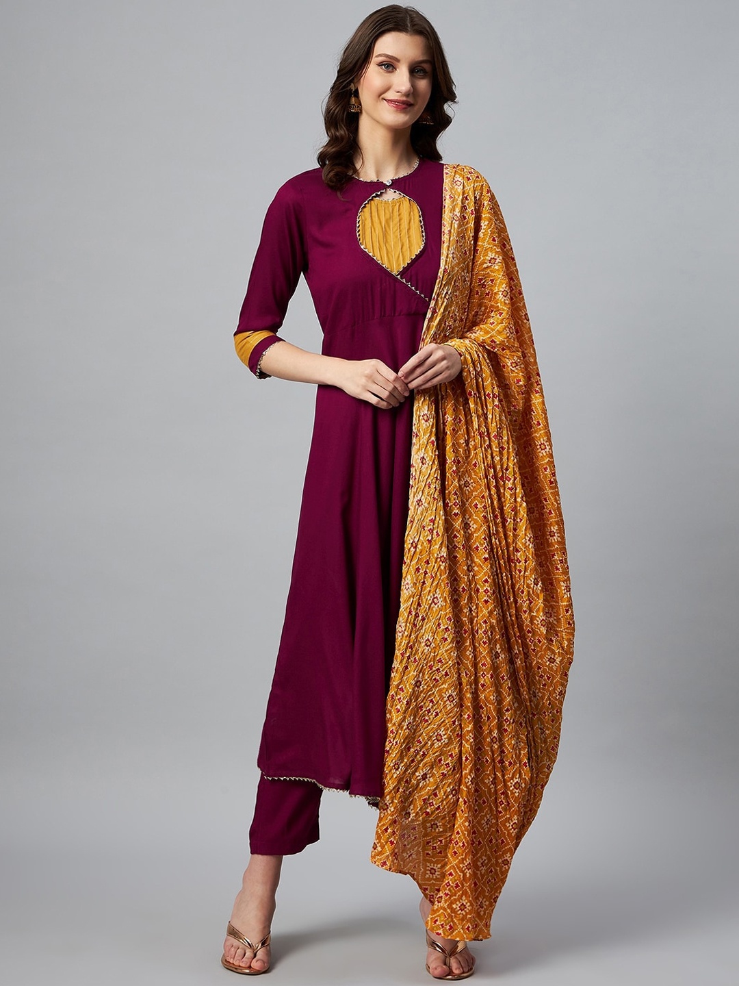 

InWeave Women Maroon & Mustard Solid Anarkali Kurta Set