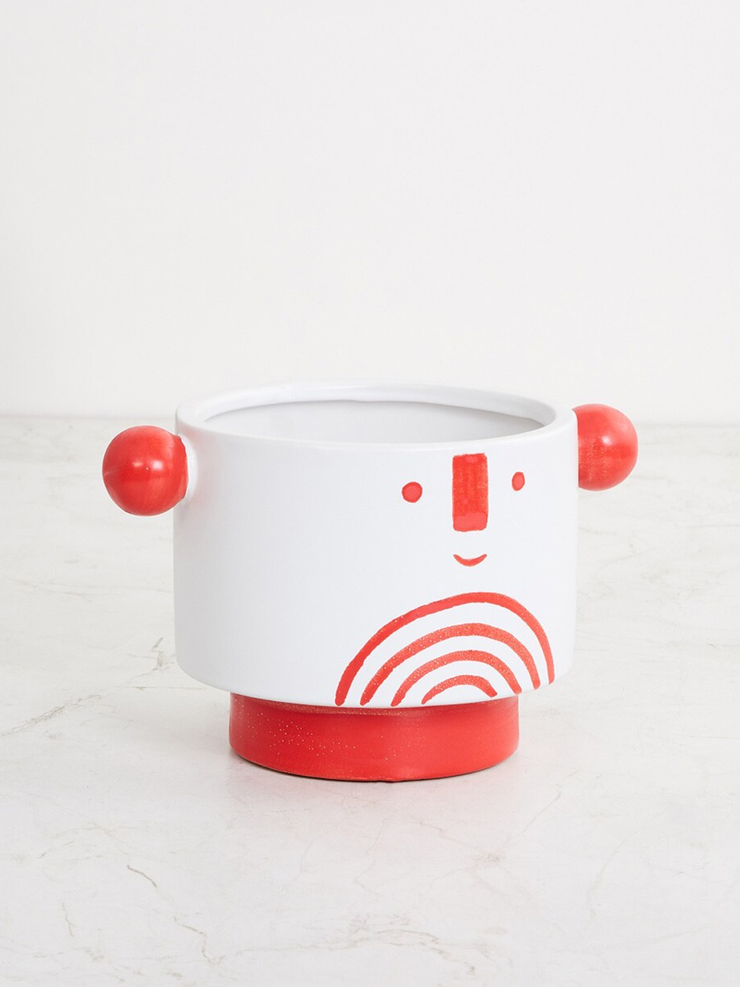 

Home Centre Red & White Printed Ceramic Face Planter