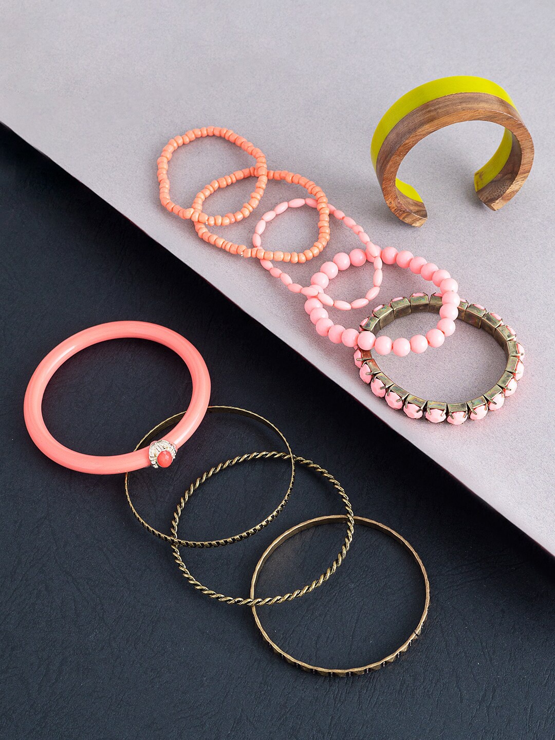 

Golden Peacock Women Set of 10 Peach-Coloured & Yellow Bracelet