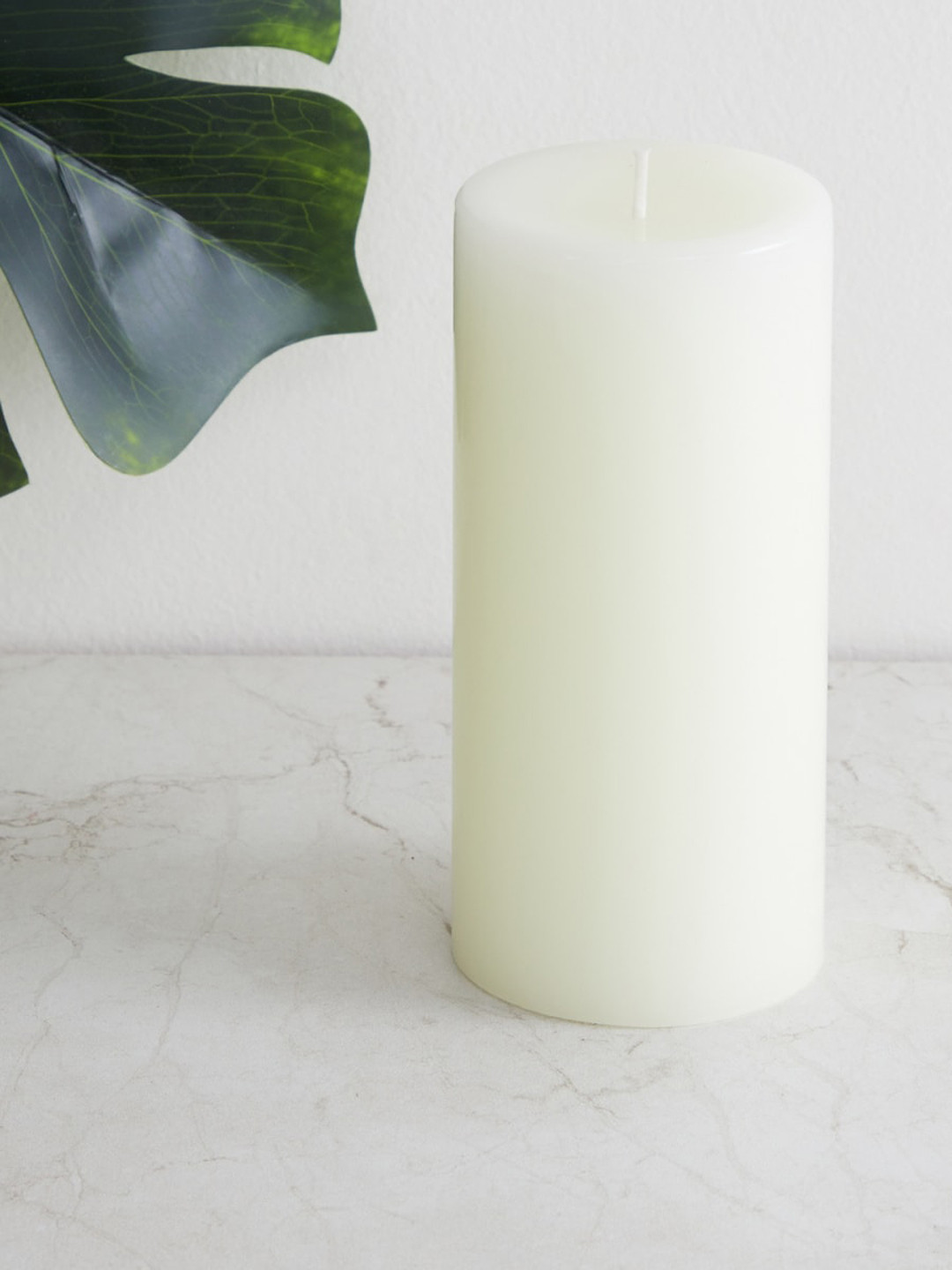 

Home Centre White Solid Vanilla Pillar Candles