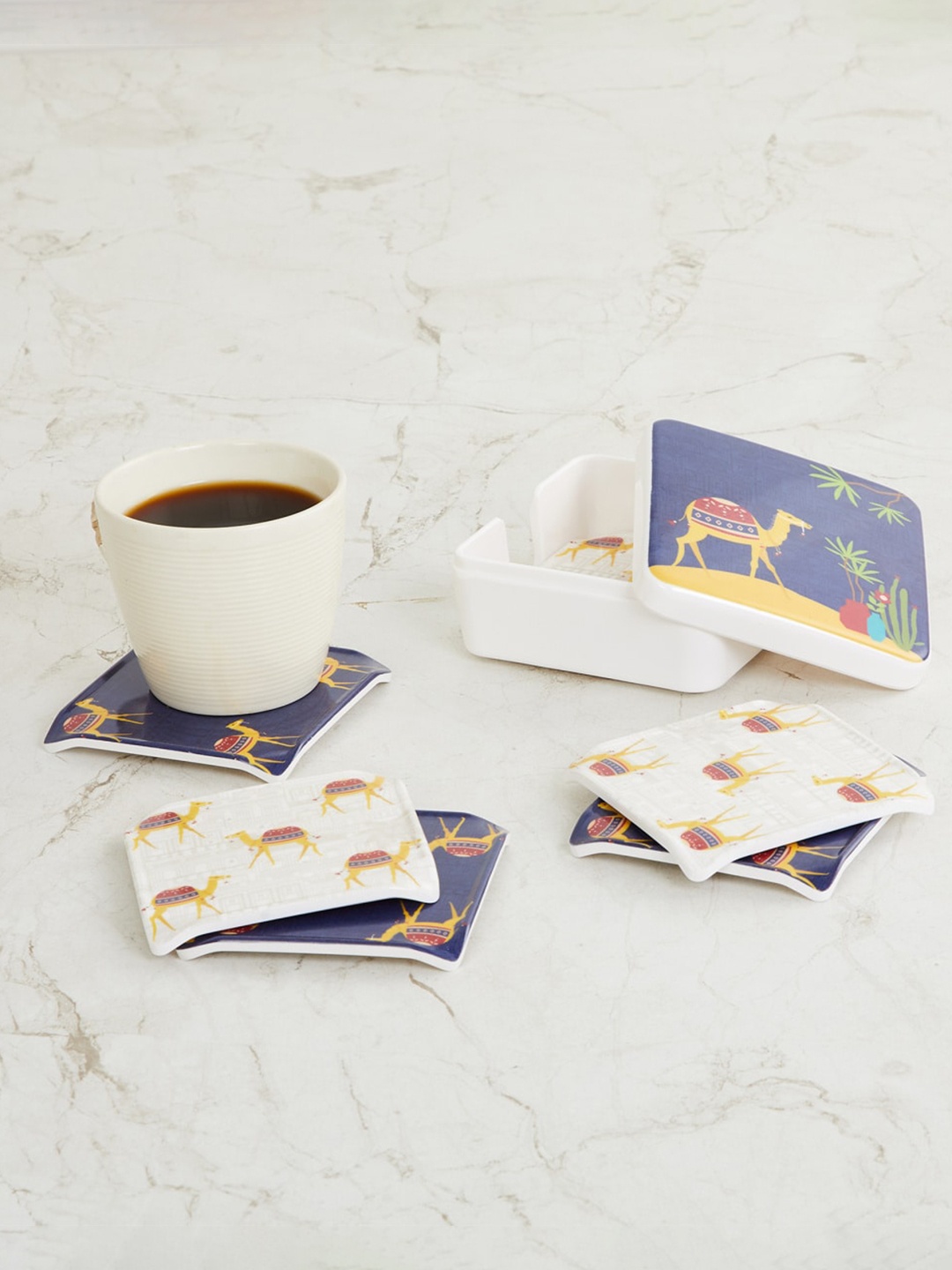 

Home Centre Set Of 6 White & Blue Printed Coasters