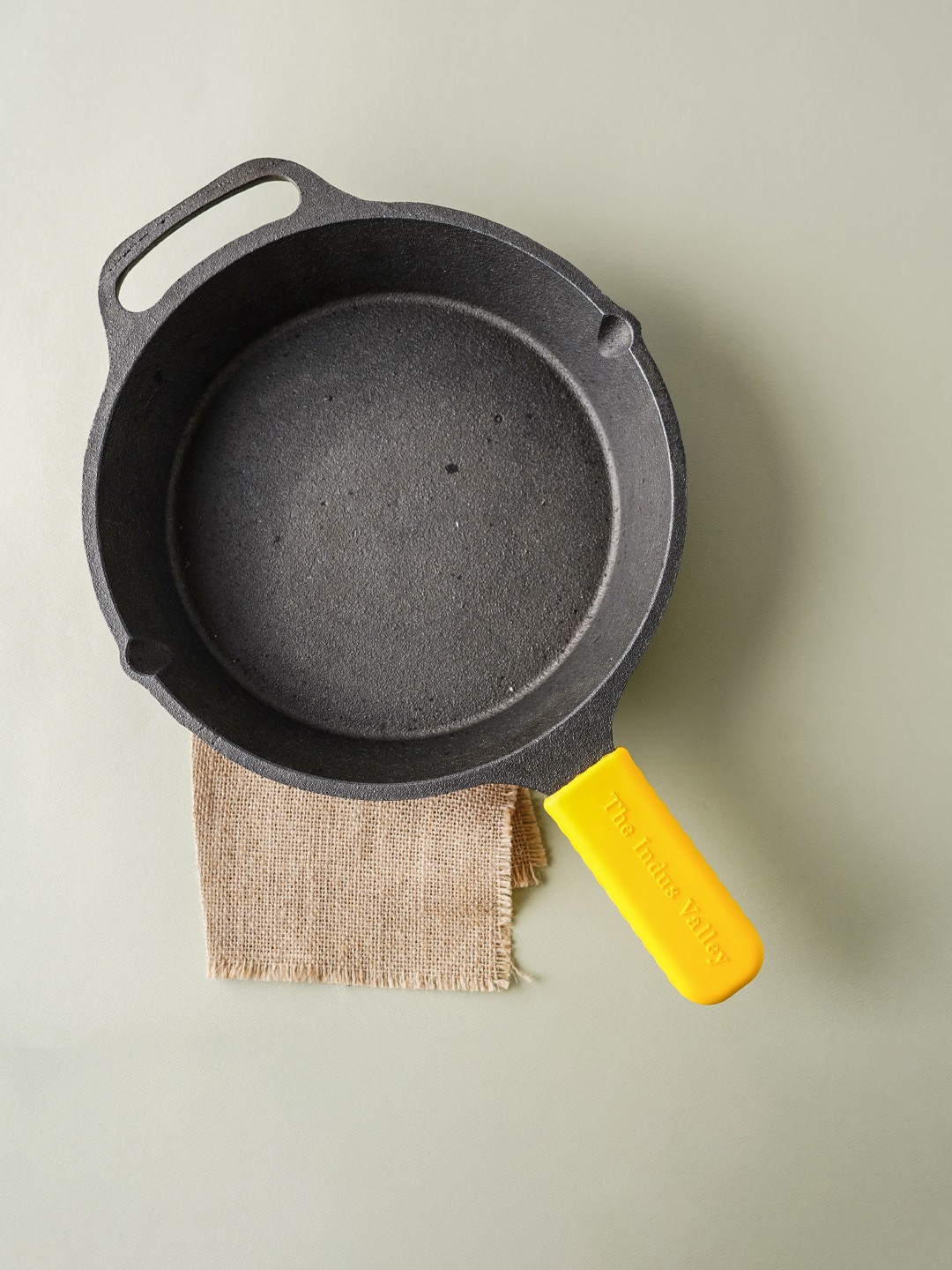 

The Indus Valley Black Pre-Seasoned Silicone Handle Super Smooth Cast Iron Skillet