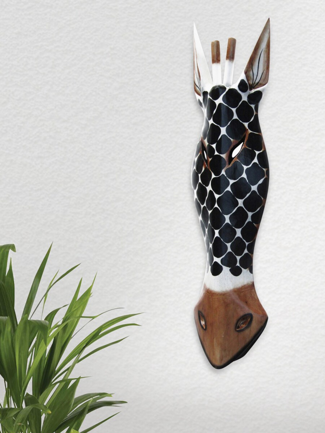

Home Centre Black & Brown Printed Wooden Mask Giraffe Wall Decor