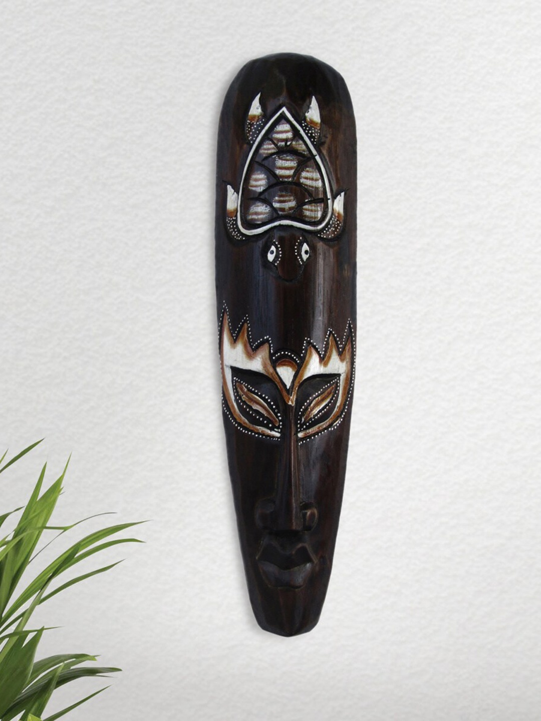 

Home Centre Corsica Brown Printed Wooden Turtle Mask Wall Decor