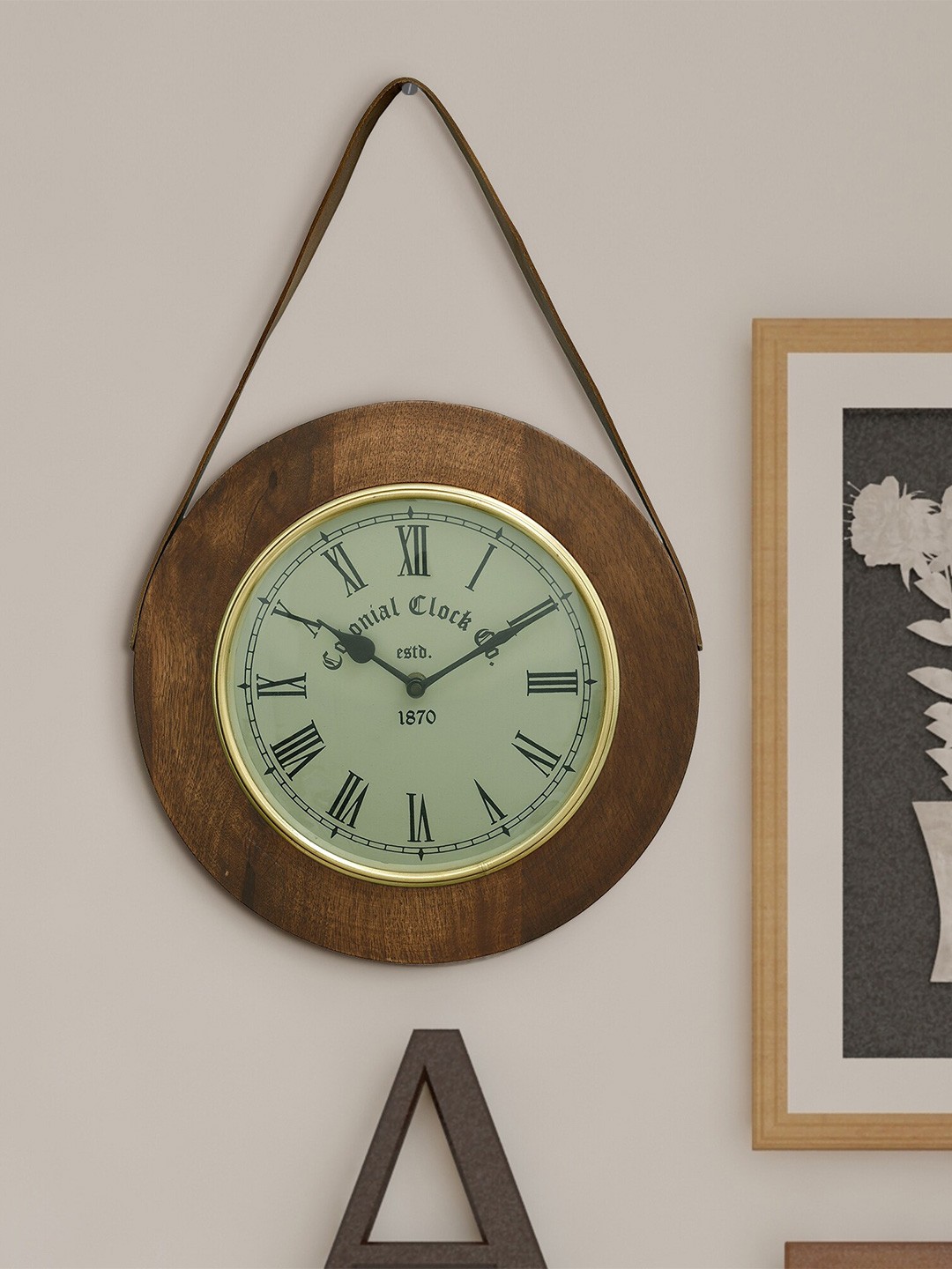 

HomeTown Brown & Black 28 cm Colourblocked Contemporary Wall Clock