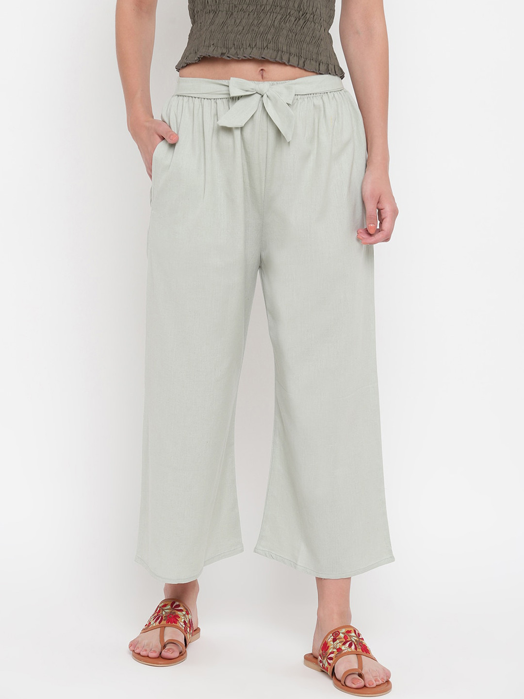 

Aawari Women Green Solid Cotton Trousers