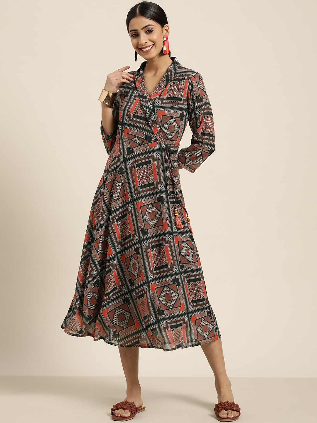 

Sangria Women Green & Orange Ethnic Printed A-Line Midi Dress