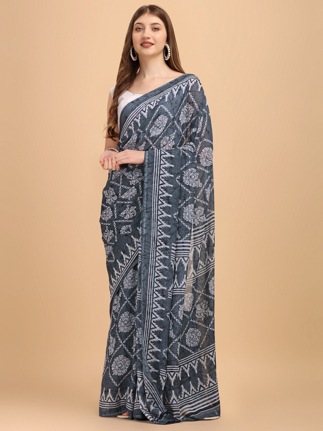 

Sangria Grey Ethnic Motifs Saree