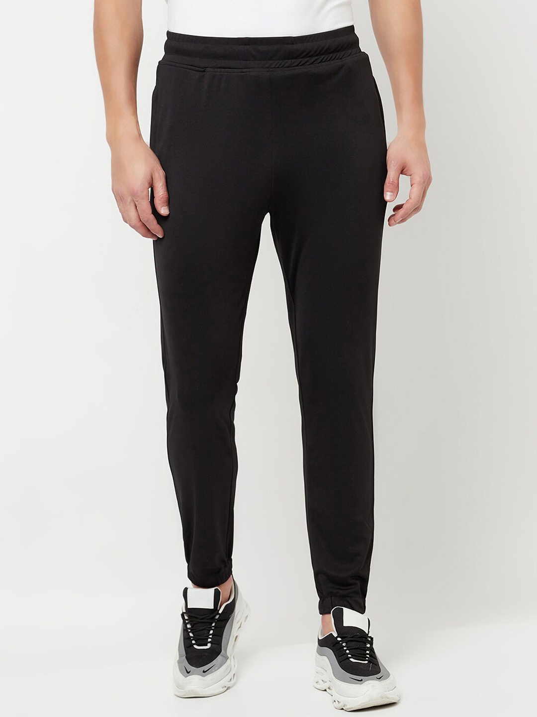 

HOLDIT Men Black Solid Track Pants