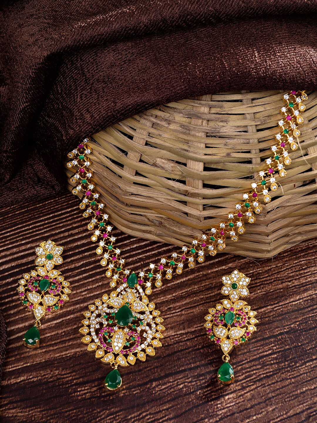 

Saraf RS Jewellery Gold-Plated Green & Pink AD Studded & Beaded Jewellery Set