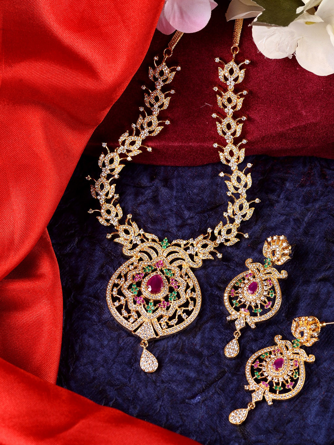 

Saraf RS Jewellery Gold-Plated Pink & White AD-Studded & Pearl Beaded Jewellery Set