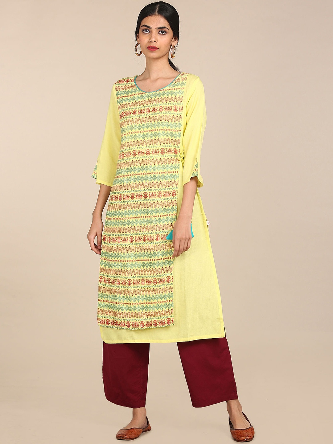 

Karigari Women Yellow Ethnic Motifs Printed A-line Round Neck three Quarter Sleeves Kurta