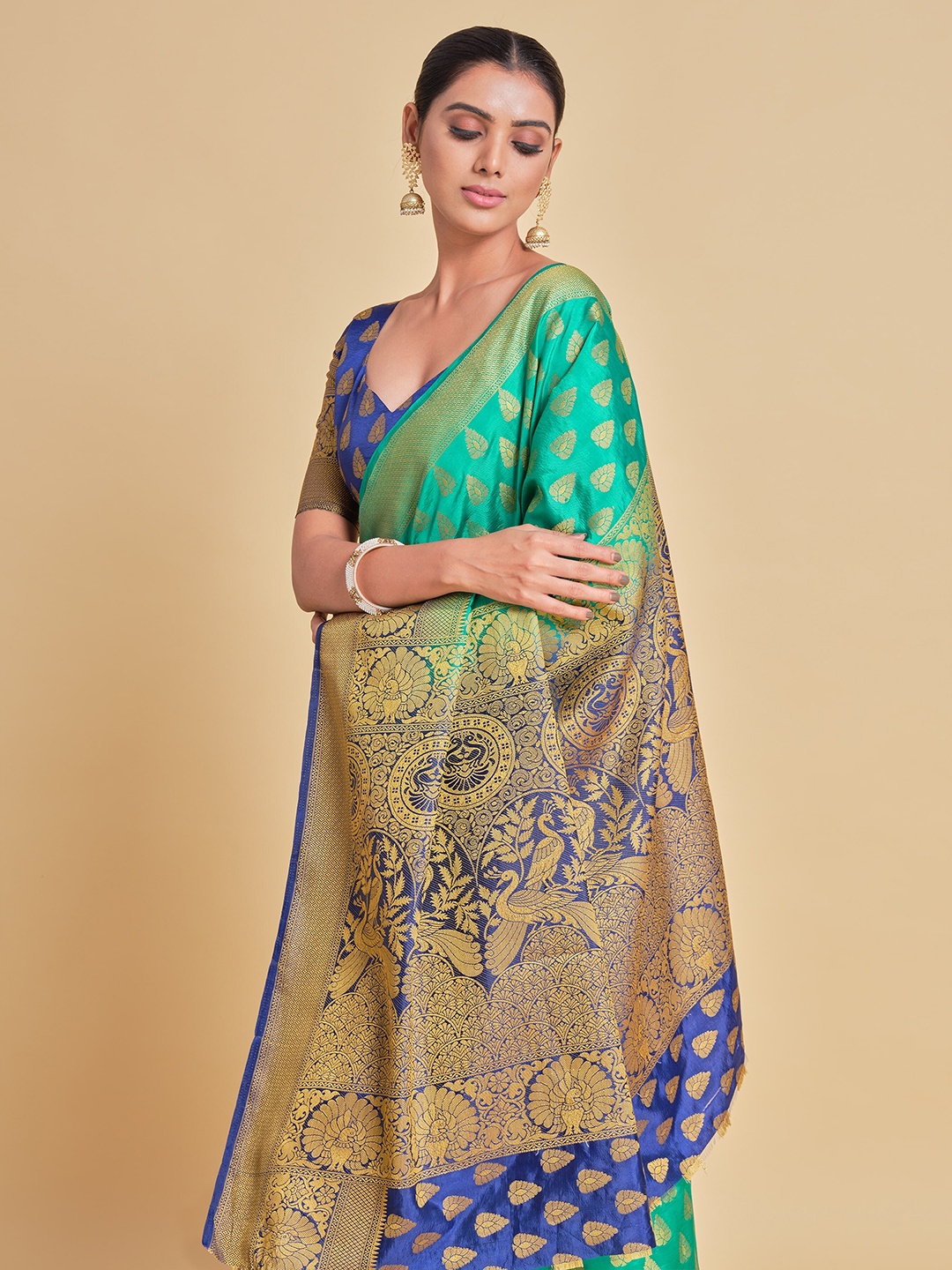 

Sangria Teal Green & Blue Woven Design Silk Blend Saree
