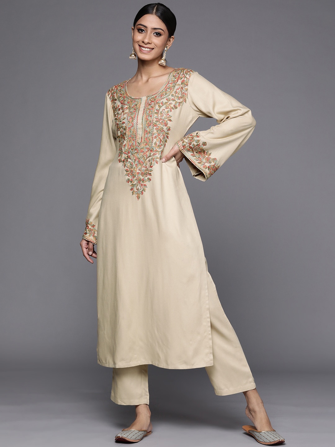 

Libas Women Beige Ethnic Motifs Yoke Design Flared Sleeves Embroided Floral Kurta
