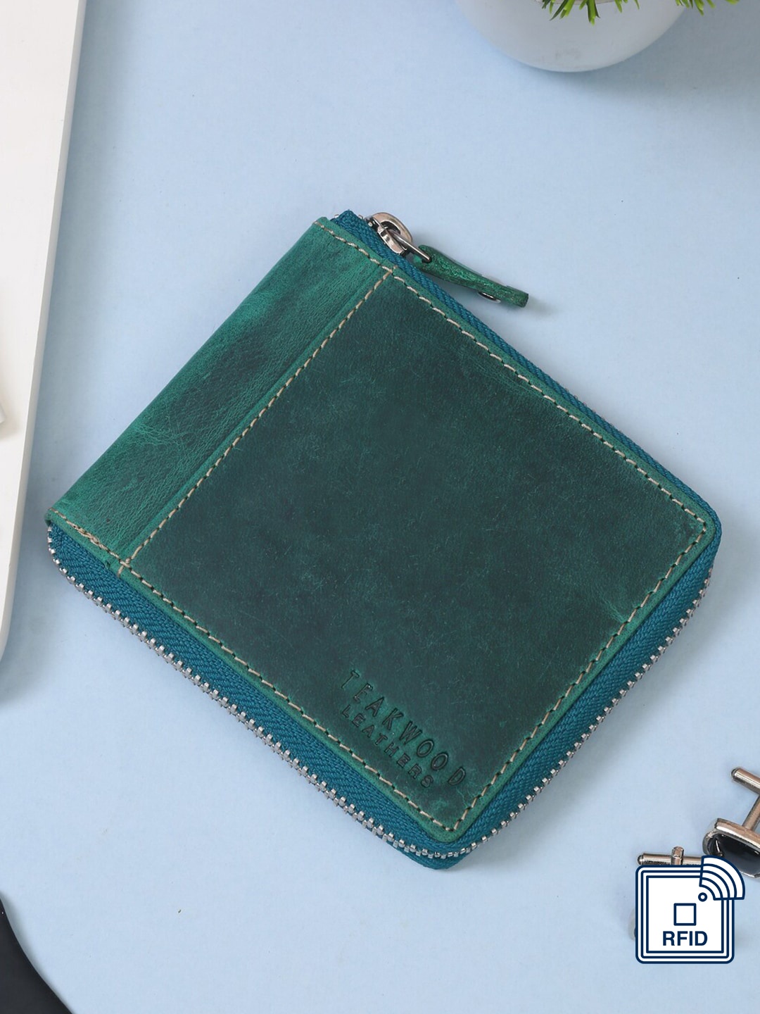 

Teakwood Leathers Men Teal Leather Zip Around Solid Wallet with RFID Features.