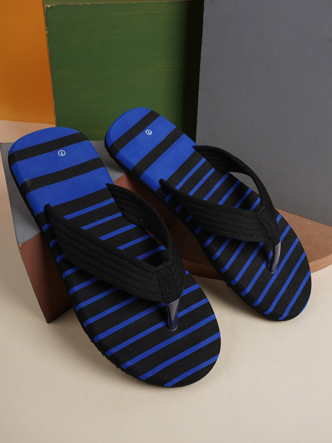 

Walkfree Men Blue & Black Striped Thong Flip Flops