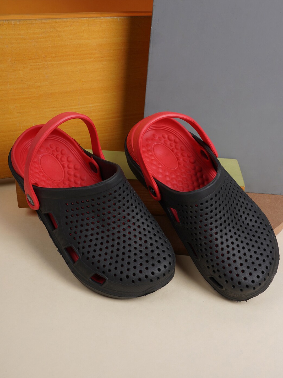 

Walkfree Men Black & Red Solid Rubber Clogs