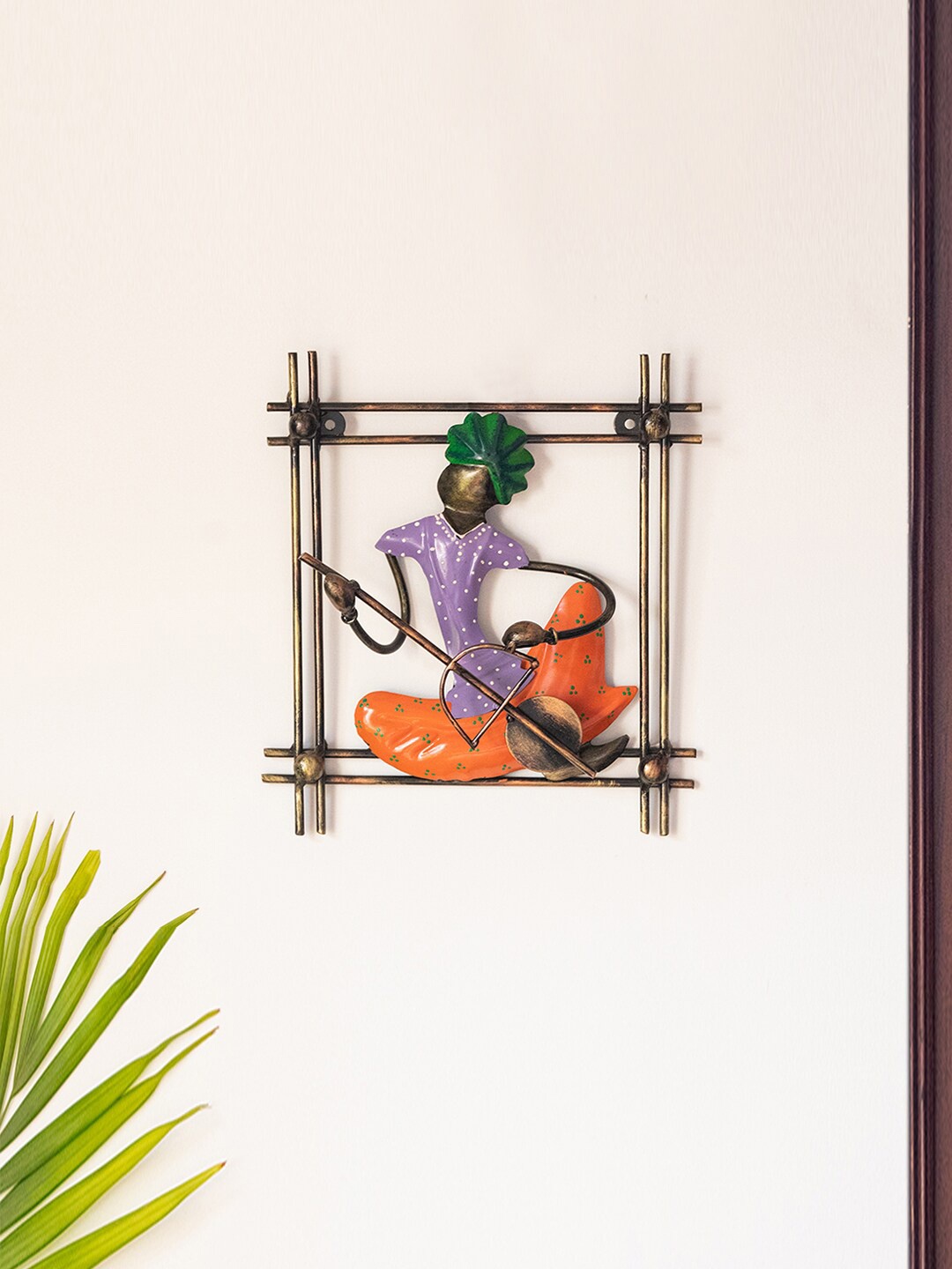 

ExclusiveLane Black & Purple Rajasthani Veena Musician Wall Decor