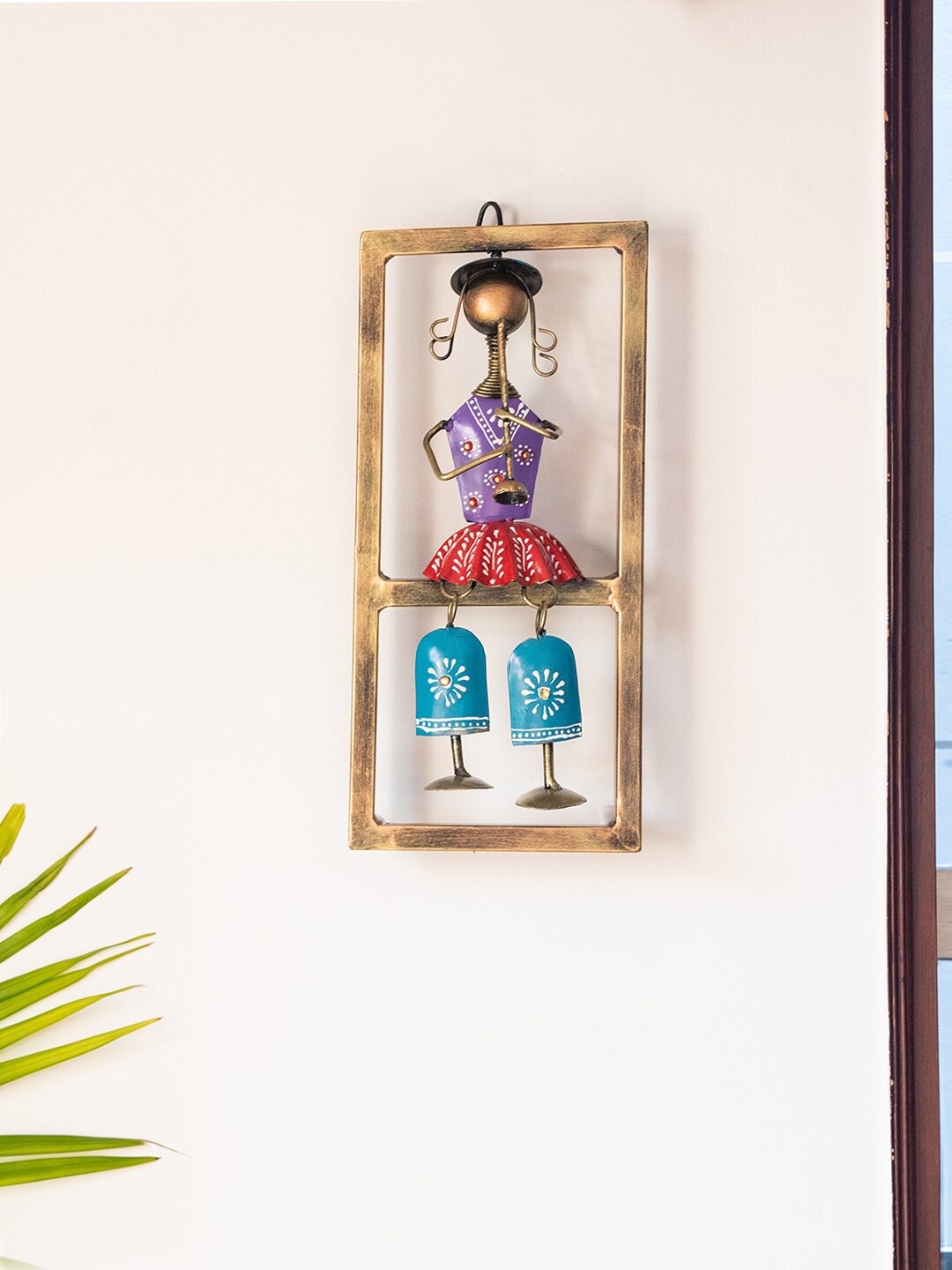 

ExclusiveLane Purple & Red Rajasthani Bansuri Artist Wall Decor Hangings