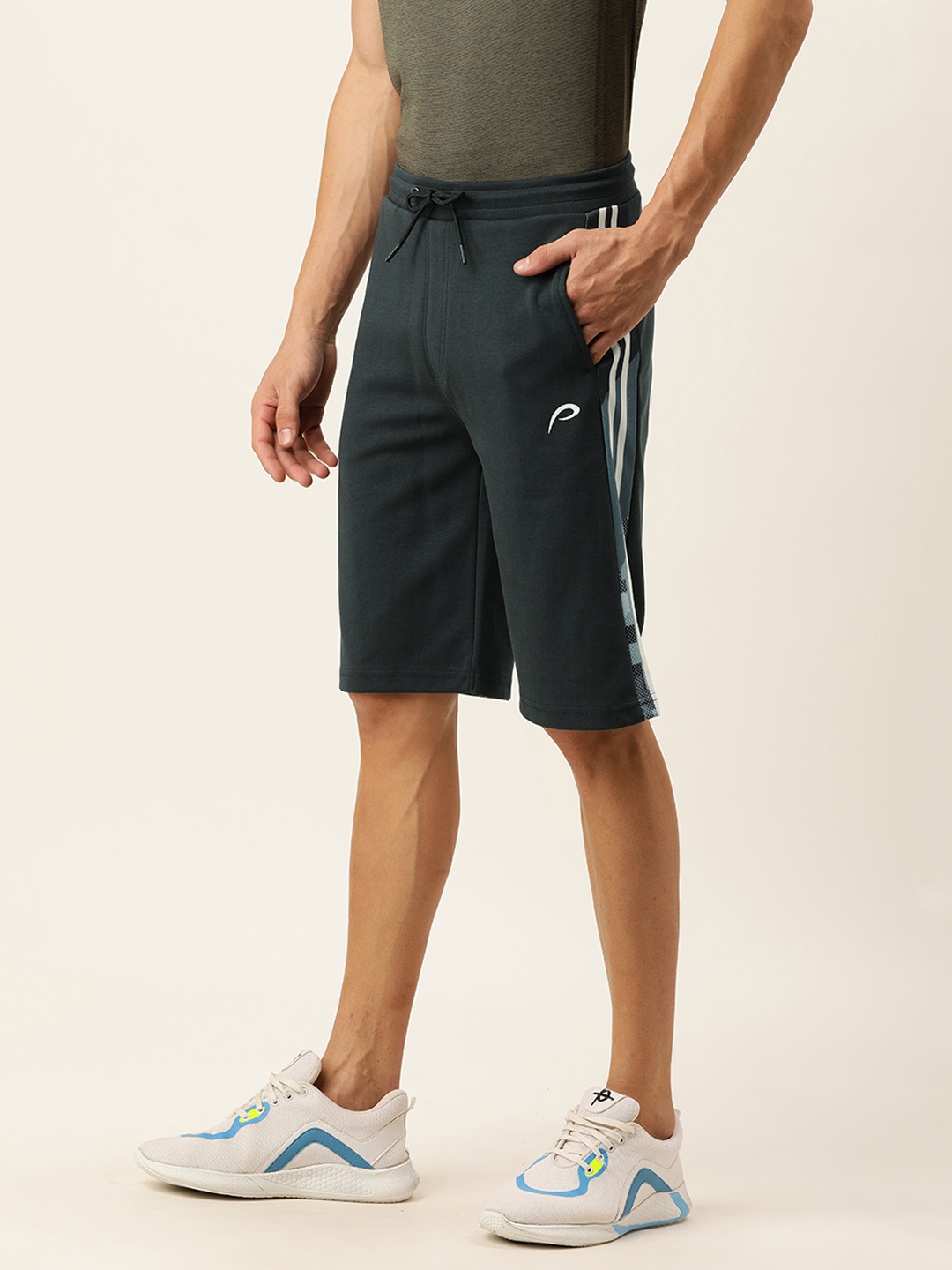 

Proline Active Men Teal Blue Solid Rapid-Dry Sports Shorts With Side Stripes
