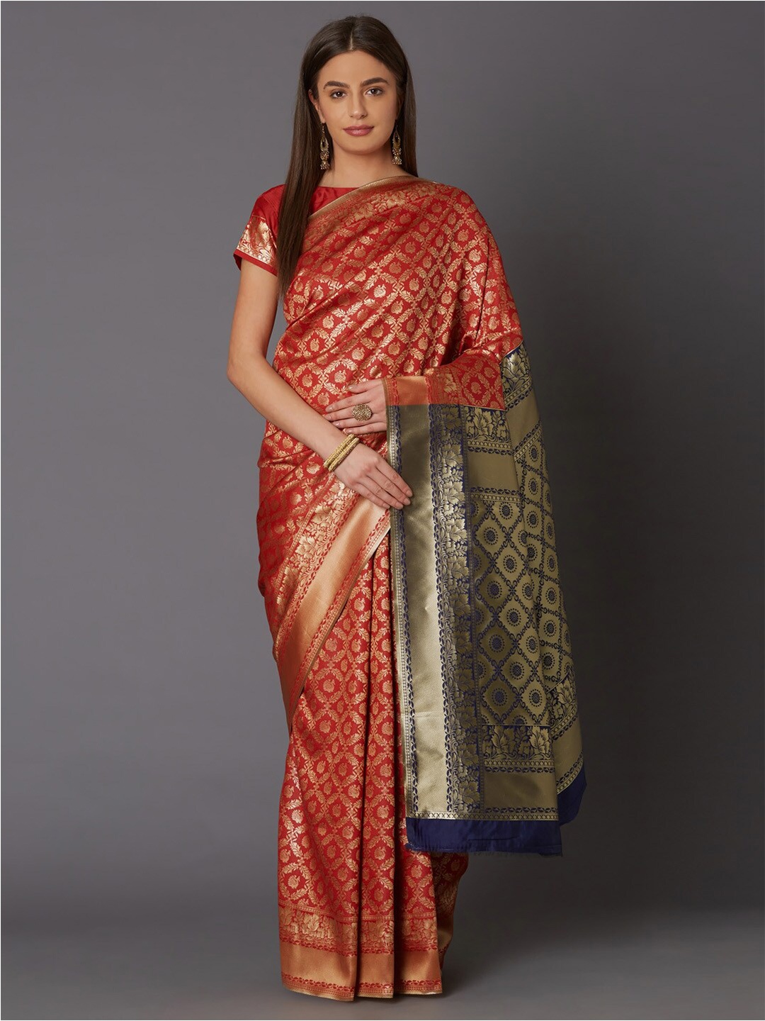 

KALINI Orange & Golden Ethnic Motifs Silk Blend Saree
