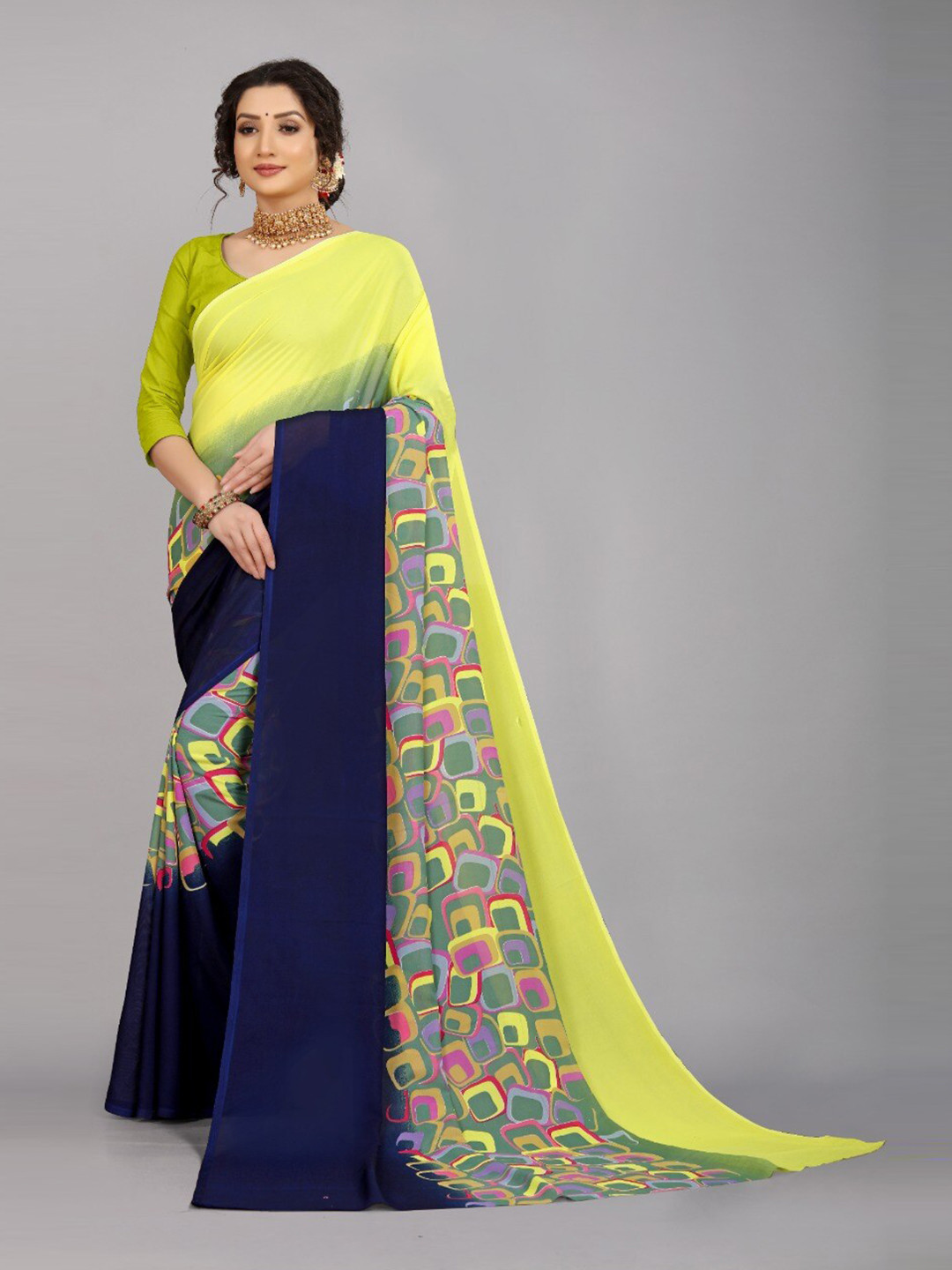 

Ratan Creation Yellow & Navy Blue Printed Pure Georgette Saree