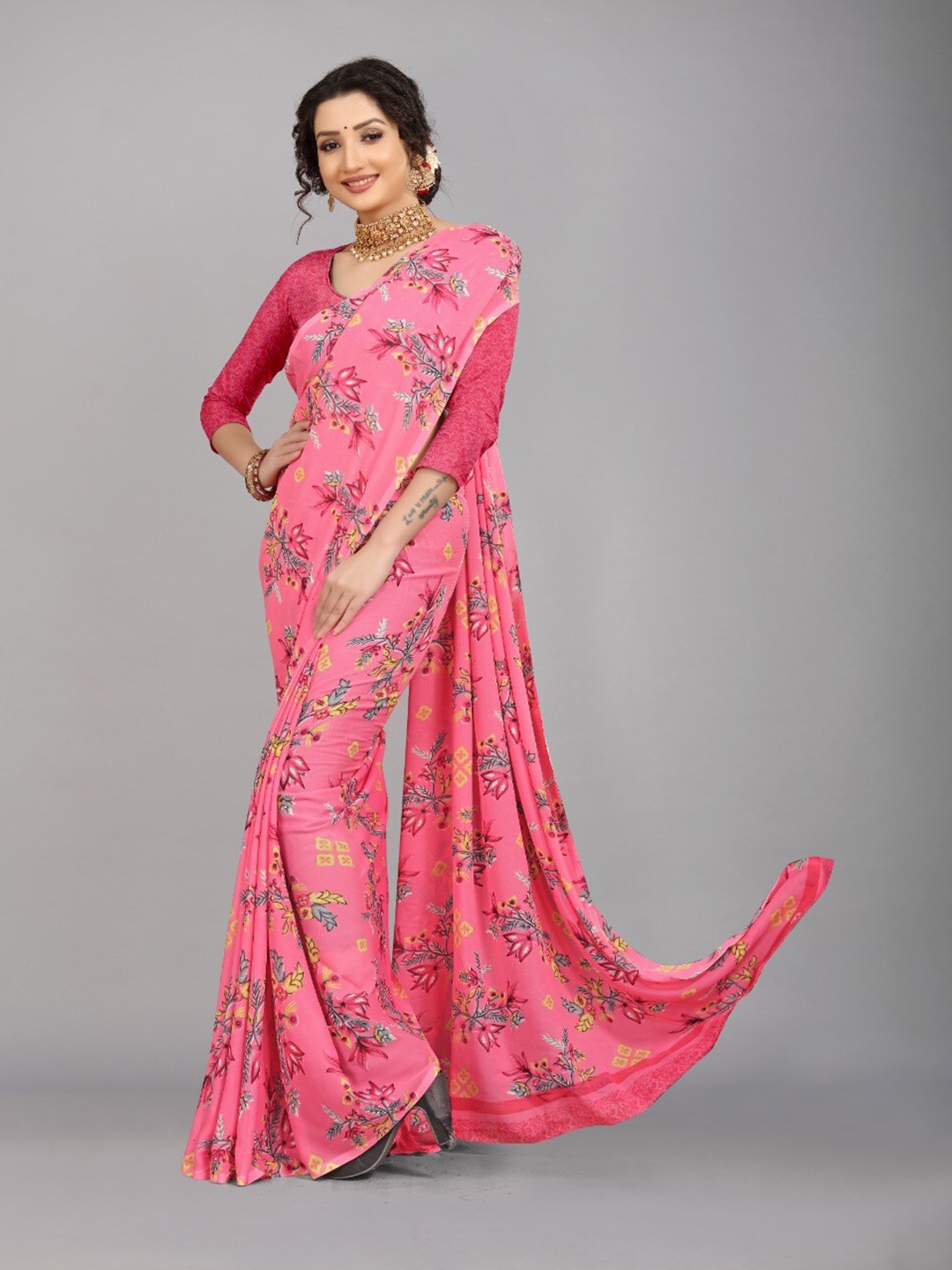 

Ratan Creation Pink & Grey Floral Pure Georgette Saree