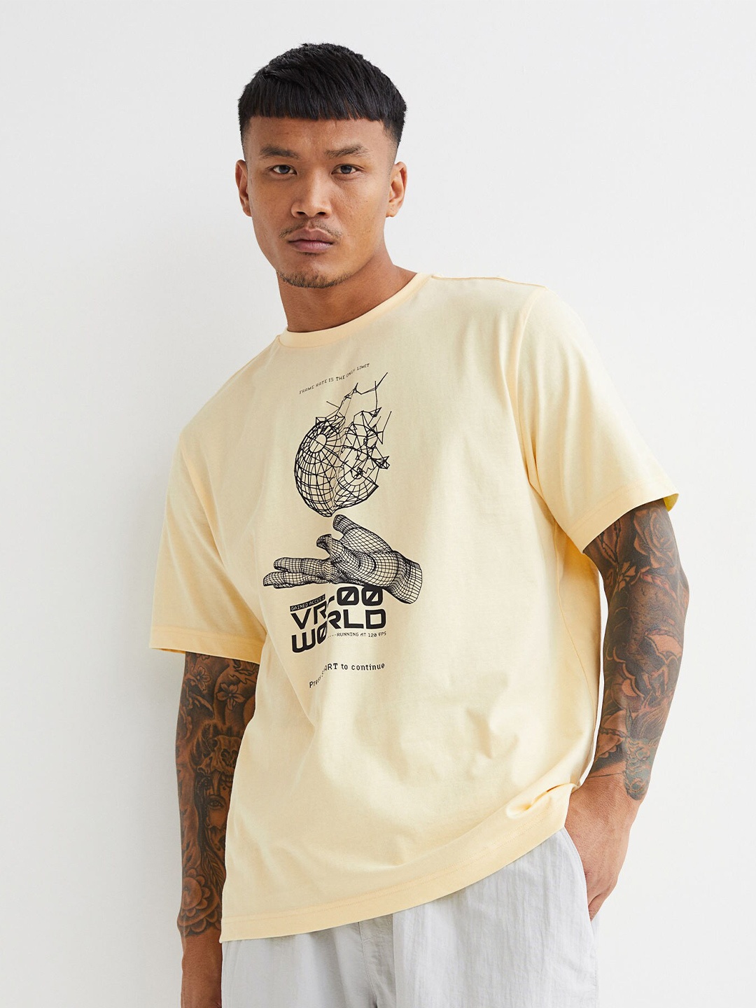 

H&M Men Yellow Printed T-shirt