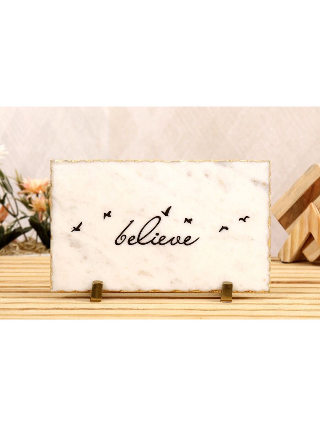

POSH-N-PLUSH White & Black Believe Printed Marble Showpiece