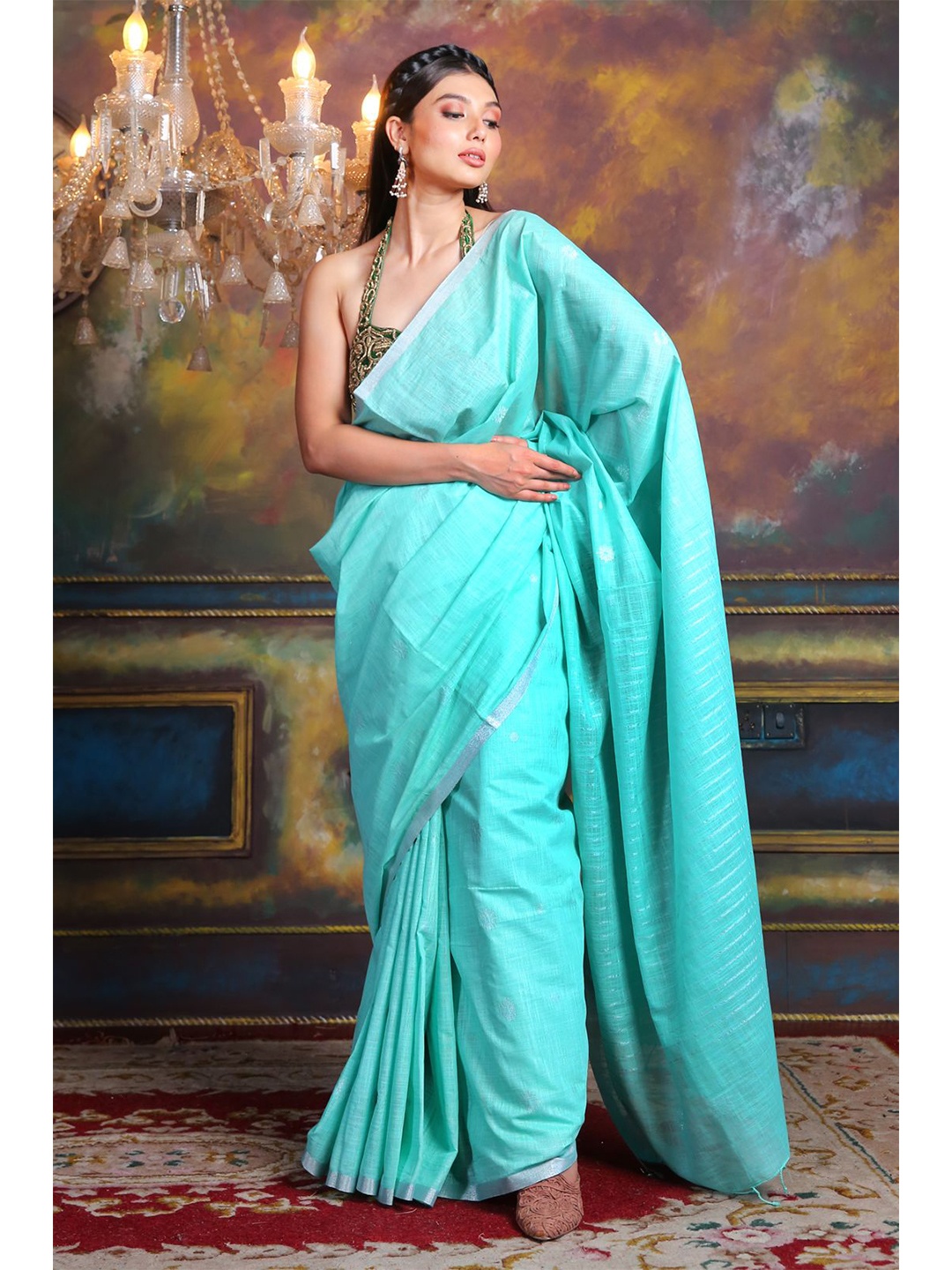 

Charukriti Sea Green Woven Design Silk Blend Saree