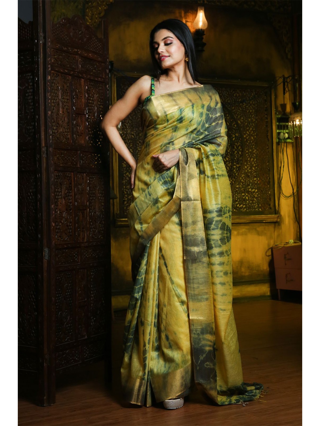 

Charukriti Yellow & Green Silk Blend Tie & Dye Saree