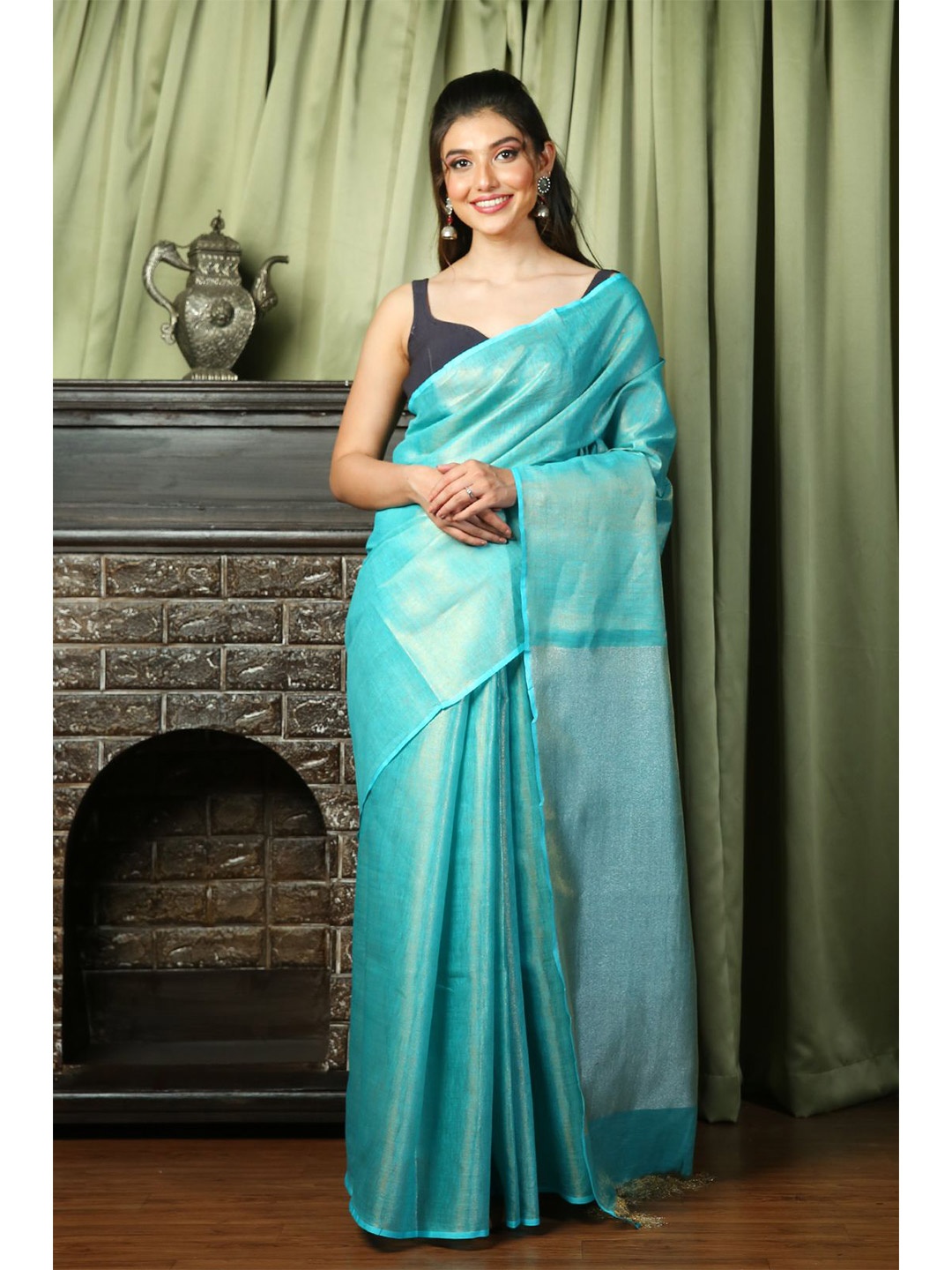 

Charukriti Sea Green Woven Design Silk Blend Saree