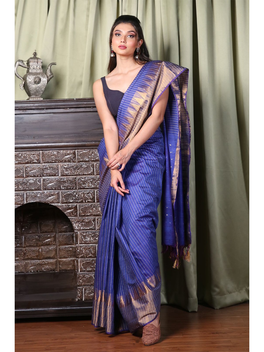 

Charukriti Blue & Gold-Toned Striped Zari Silk Blend Saree